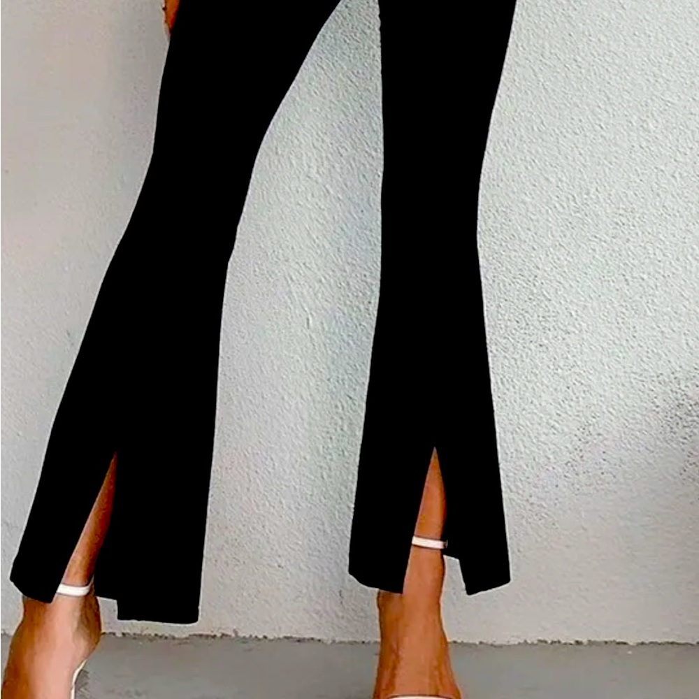 Pants Black front split. Designer style Sz L Bodycon fit.